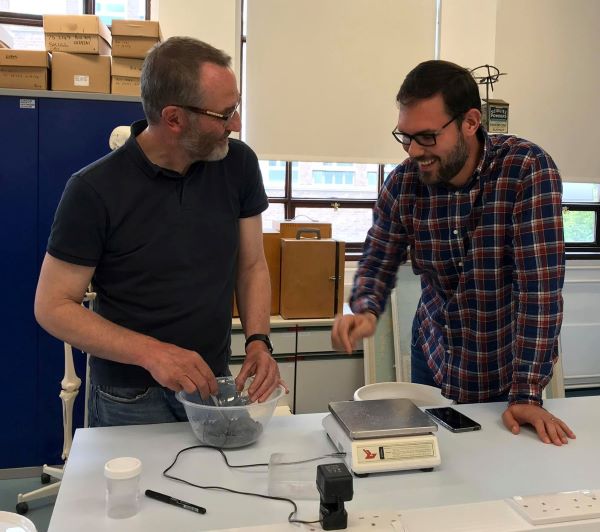 Javier Lopez Rider (right) and John Pearson discussing the experimental reconstruction of medieval glass recipes in the Wolfson Laboratory